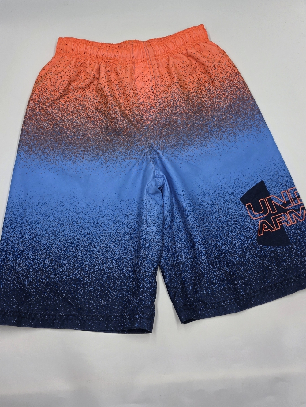 Under Armour boys' gradient orange and blue swim trunks size L